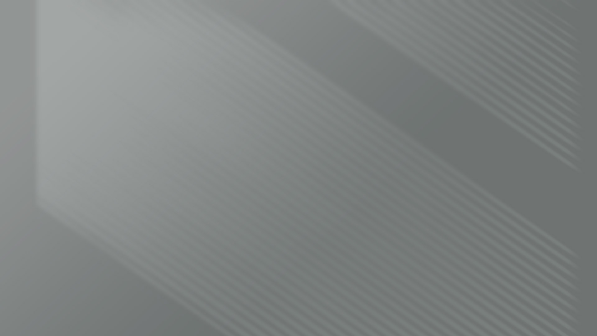 Una imagen de un fondo gris con una flecha blanca.